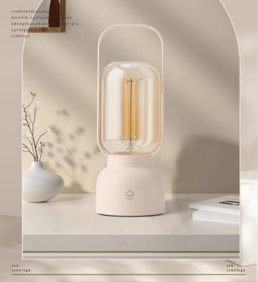 Lampada da tavolo per il festival di design moderno con luce repellente per zanzare e lampada a mano